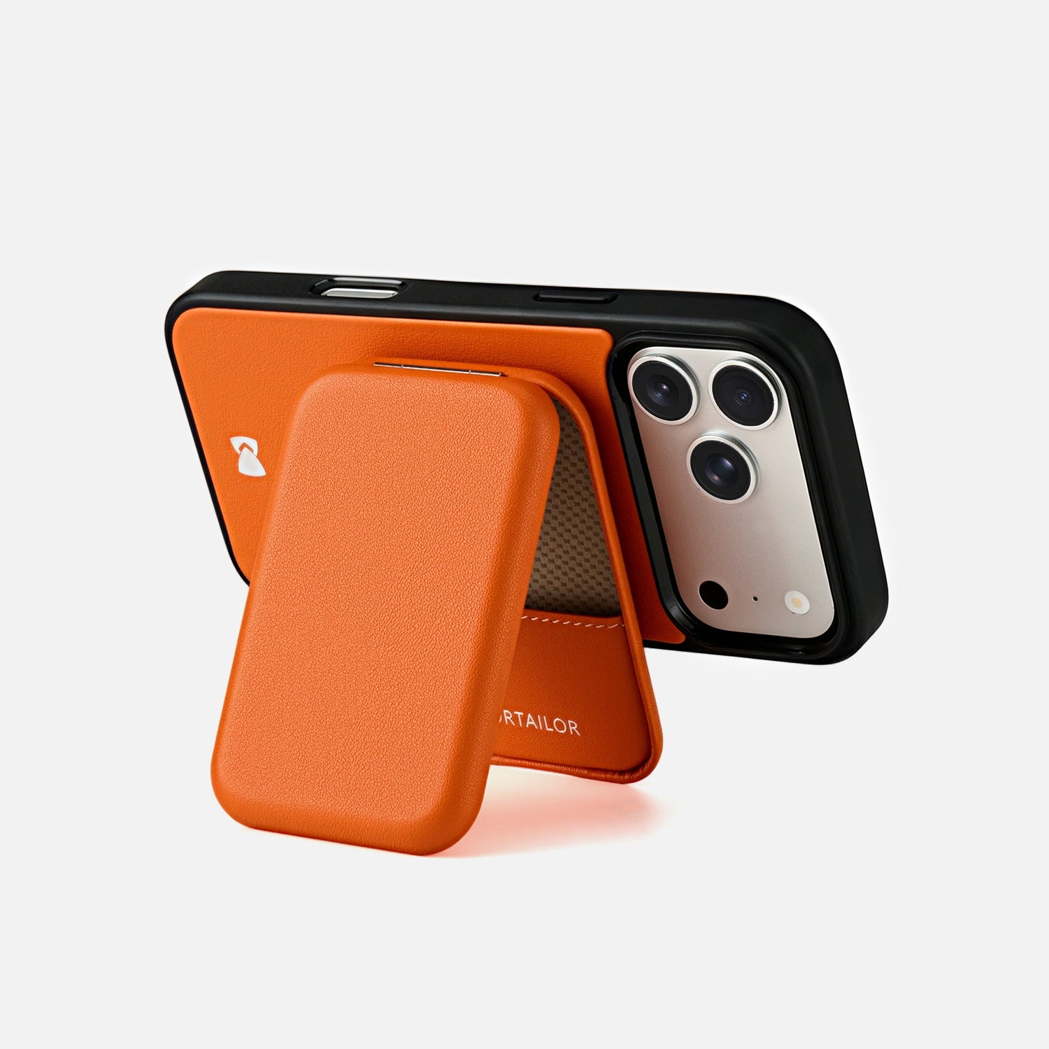 Orange CORTAILOR MagSafe Leather Wallet Stand attached to an iPhone case while a card is being pulled out in a cafe