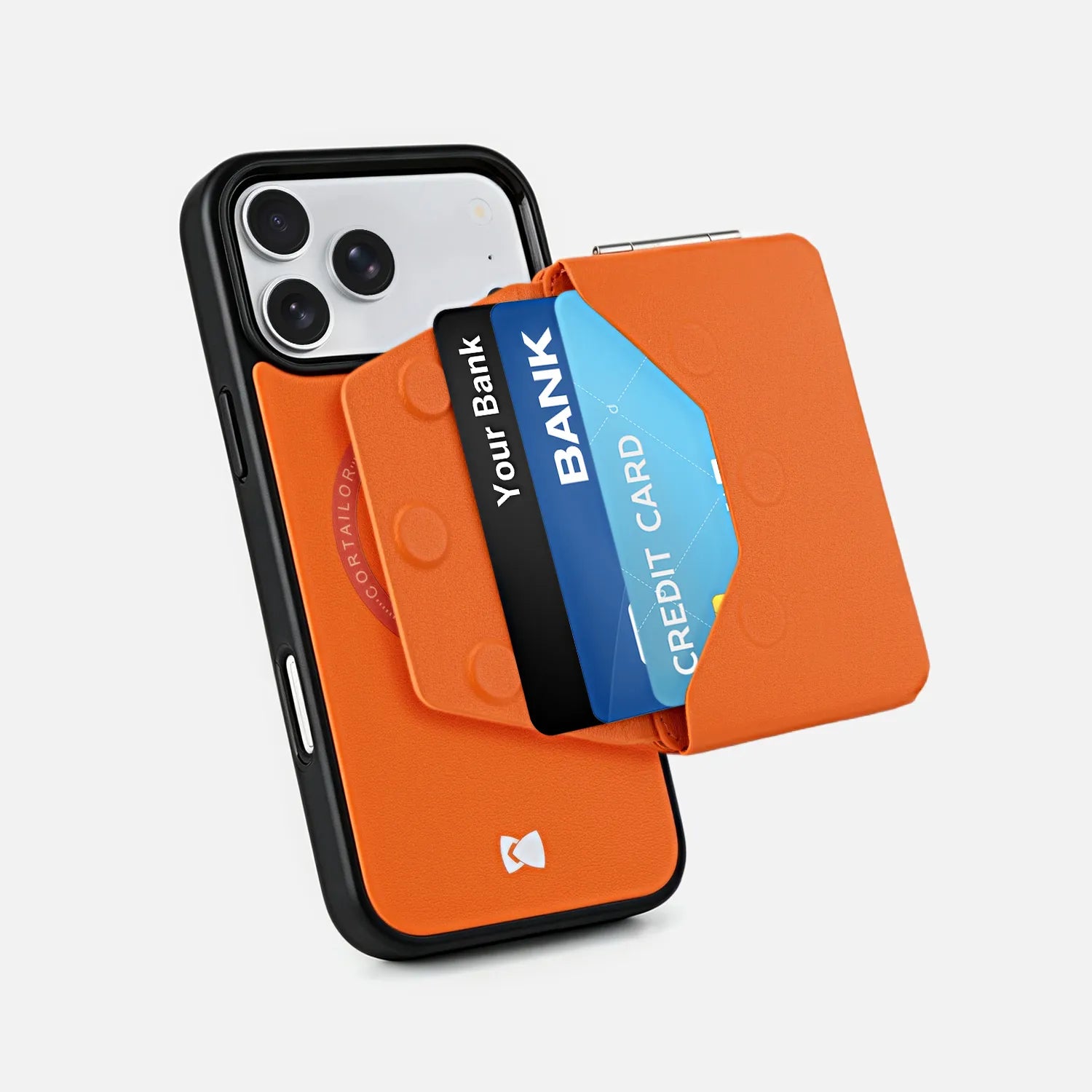 Orange CORTAILOR MagSafe Leather Wallet Stand being placed into a daily carry bag