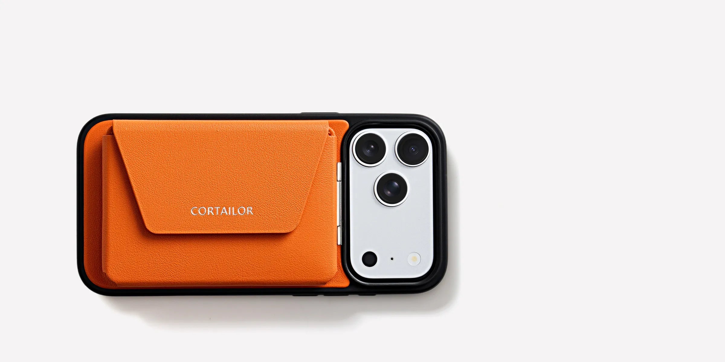 Orange CORTAILOR MagSafe Leather Wallet Stand attached to an iPhone case with front wallet flap visible